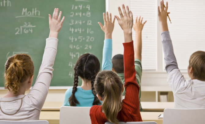Students answering teacher question