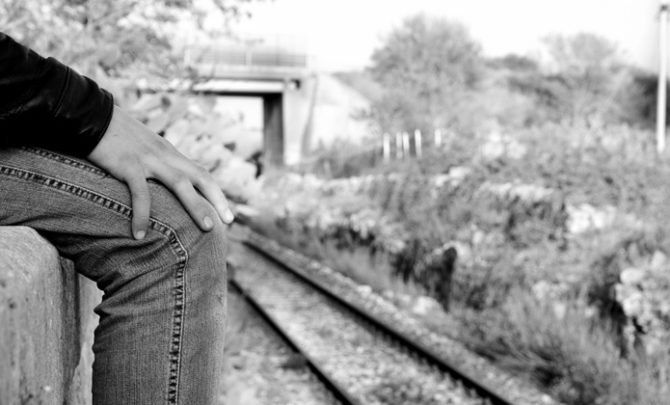 youth-suicide-teen-legs-train-tracks